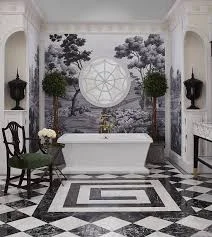 Luxury bathroom with marble tub surround, geometric floor, and botanical wall art