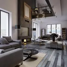 Modern kitchen and living room with gray cabinetry, concrete floors, and industrial ceiling details